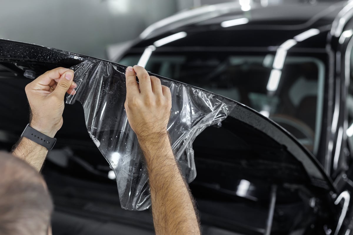 PPF paint protection film installation on car